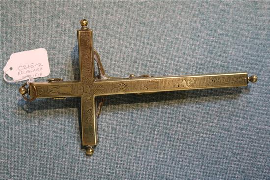 A late 19th century brass reliquary crucifix